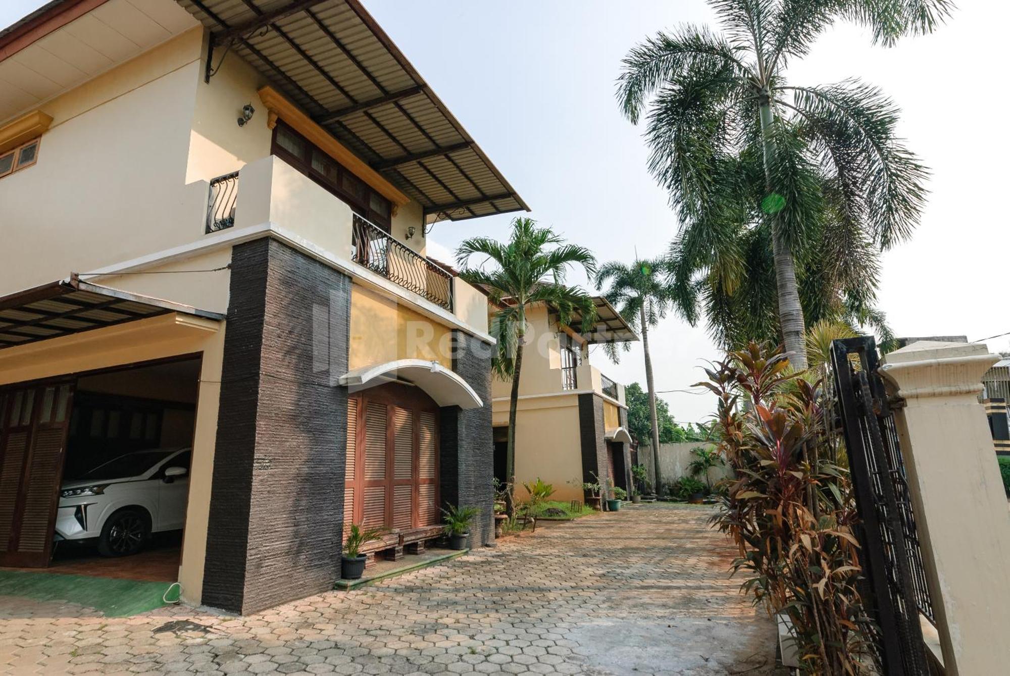 Sr Residence Near Mall Ciputra Cibubur Mitra Reddoorz Bekasi Exterior foto